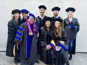 group of phd students at commencement 2022