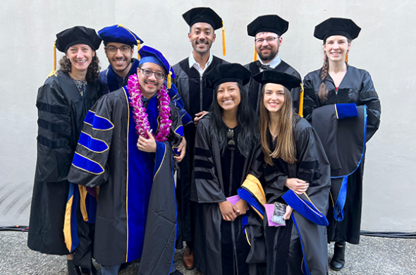 group of phd students at commencement 2022